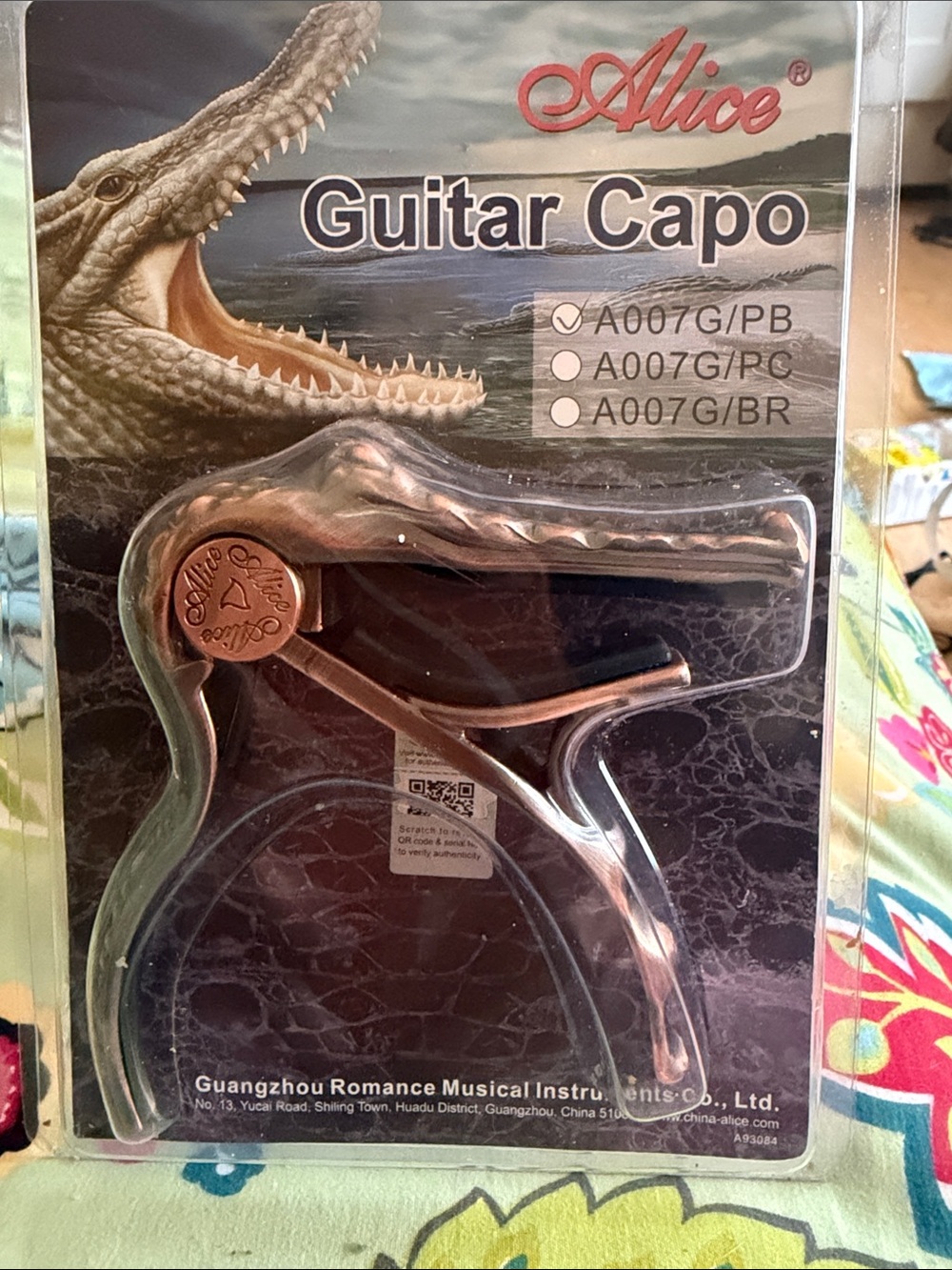 CAPO Alice Guitar Capo / Copper plate. 
Acoustic or electric… Chomp on it!!
🐊🎸 🎵